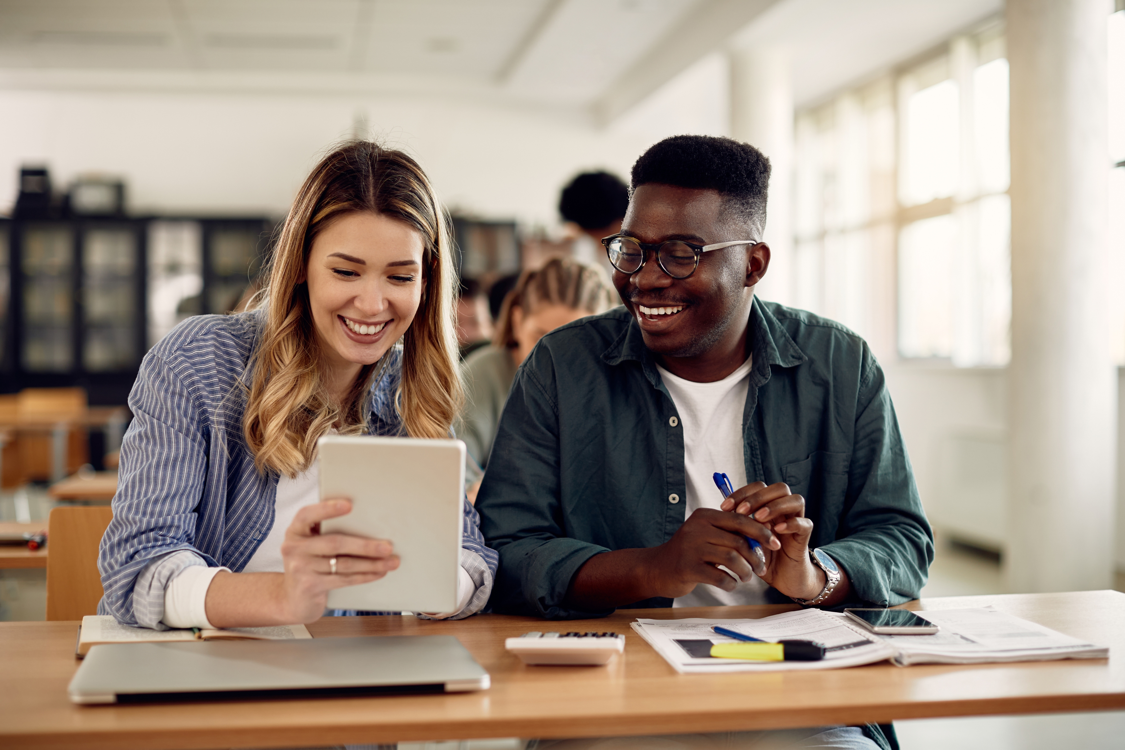 Two people studying