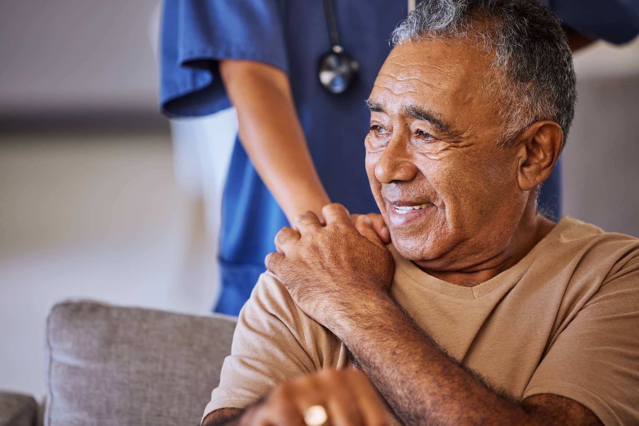 A Person comforting another person in a hospital