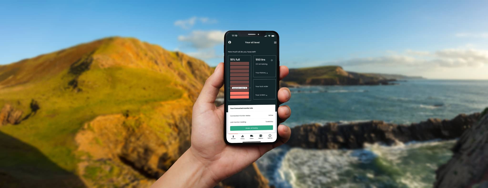 Boiler Juice App being used by man holding an iPhone