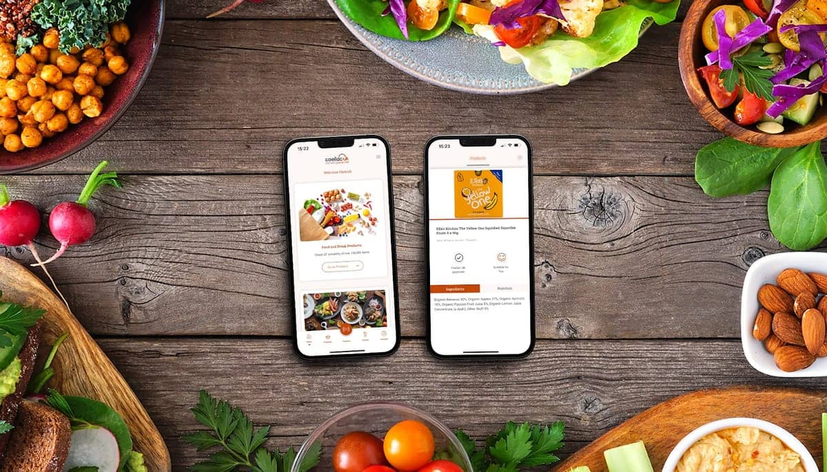 So Vegan App on iphone on table with fruit