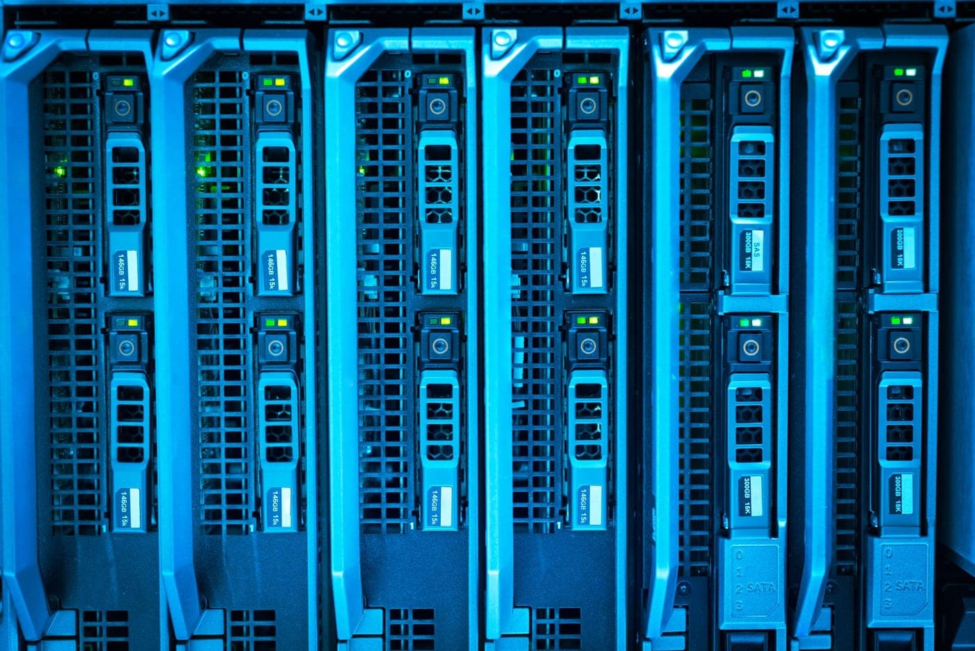 Illuminated server racks in a data centre.