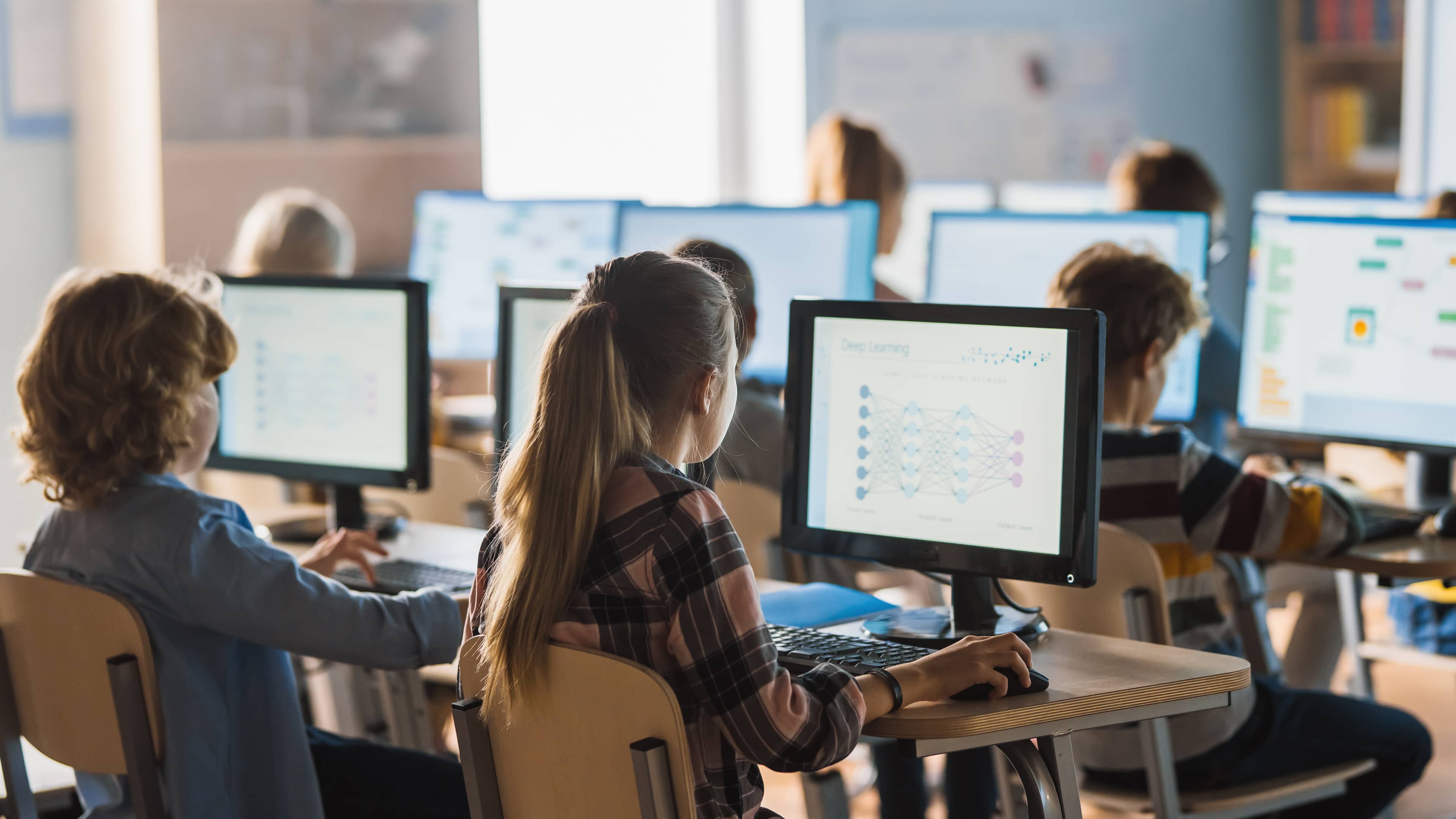 Children using computers in a classroom