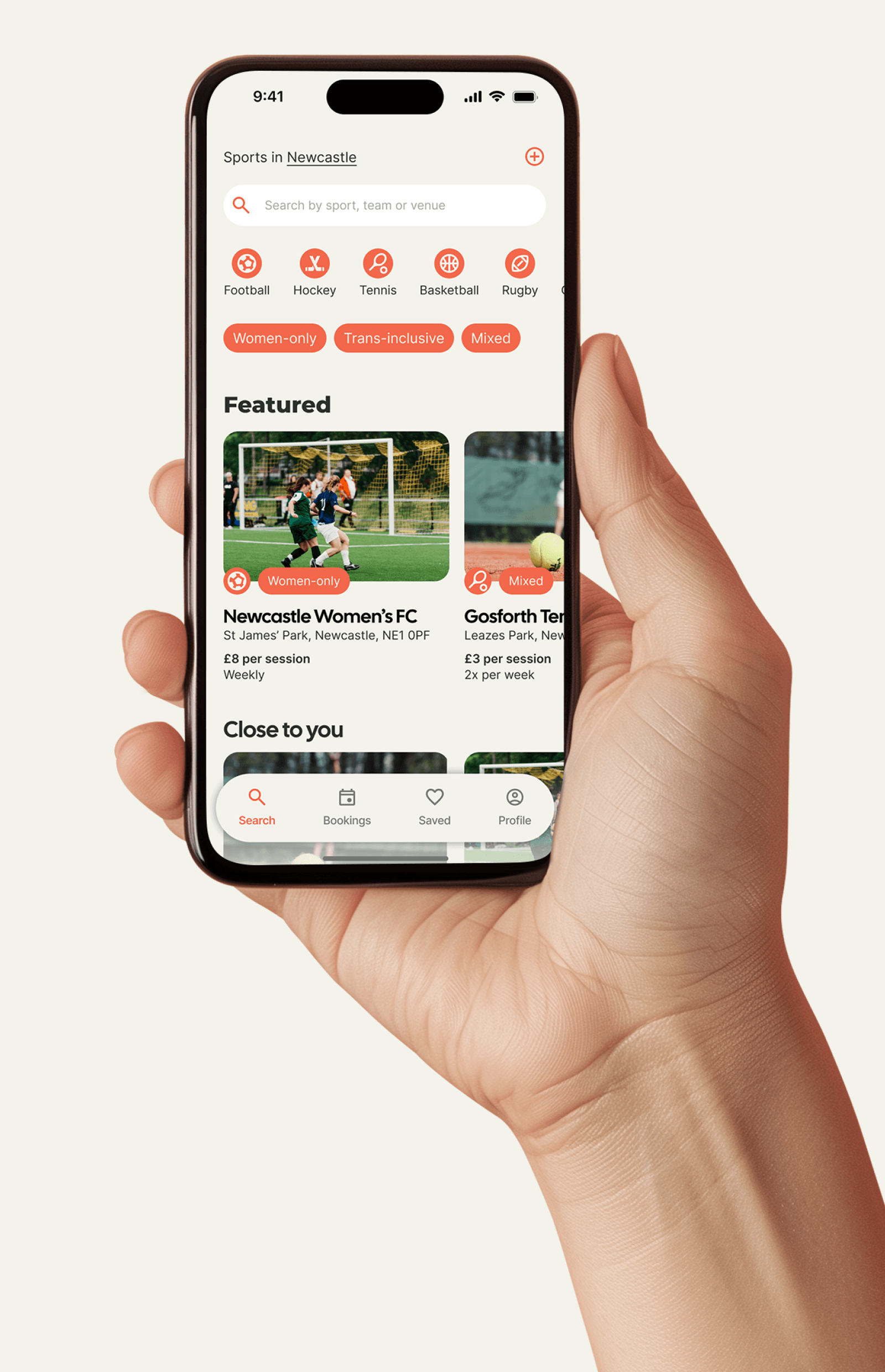 Playbooked app on a mobile phone in a hand