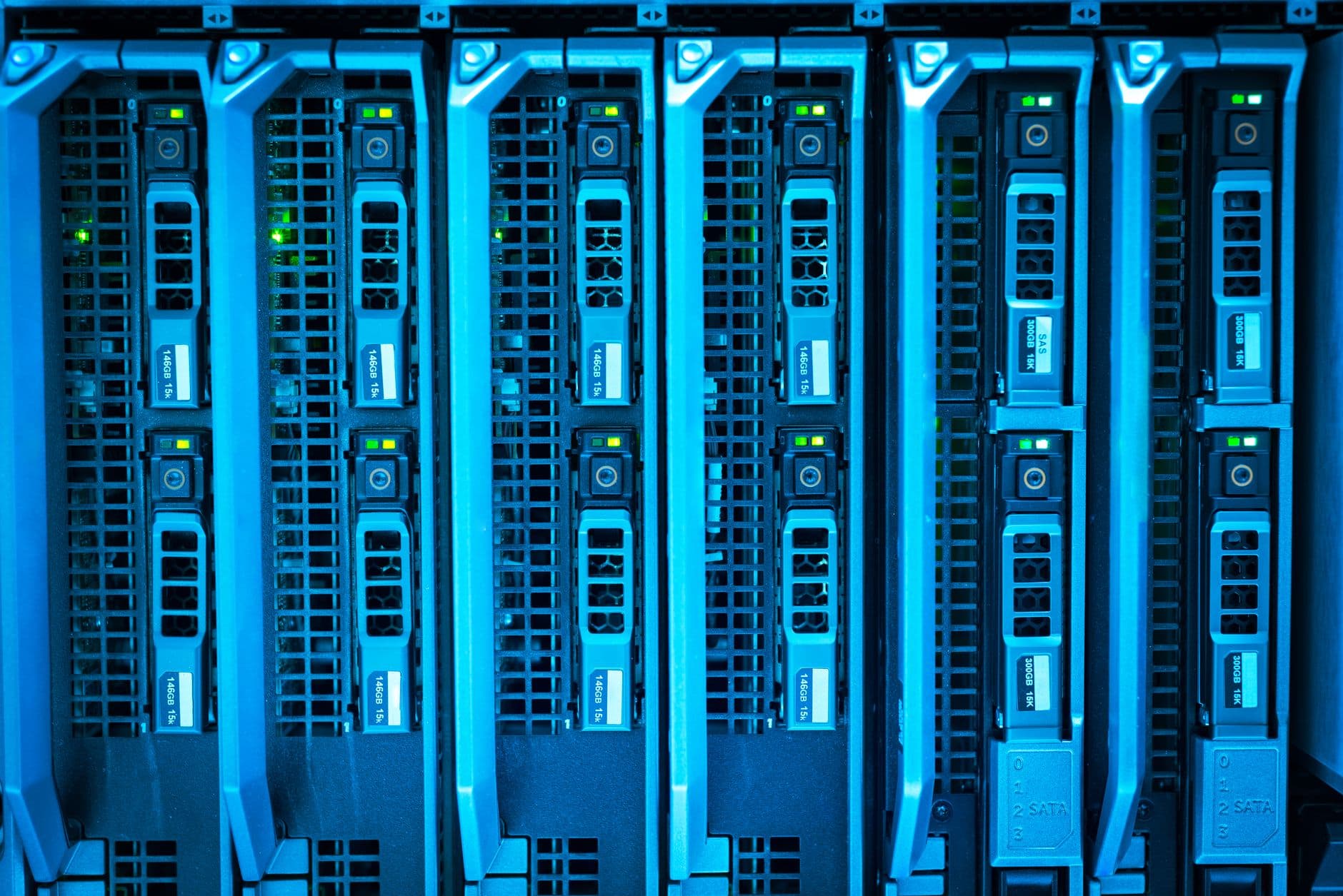 Illuminated server racks in a data centre.
