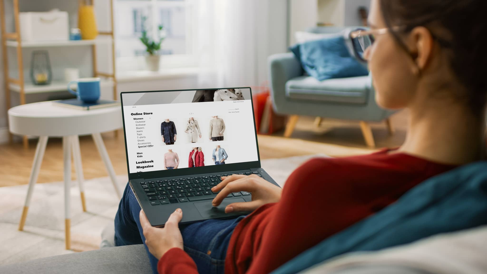 A person on a laptop looking at an ecommerce store